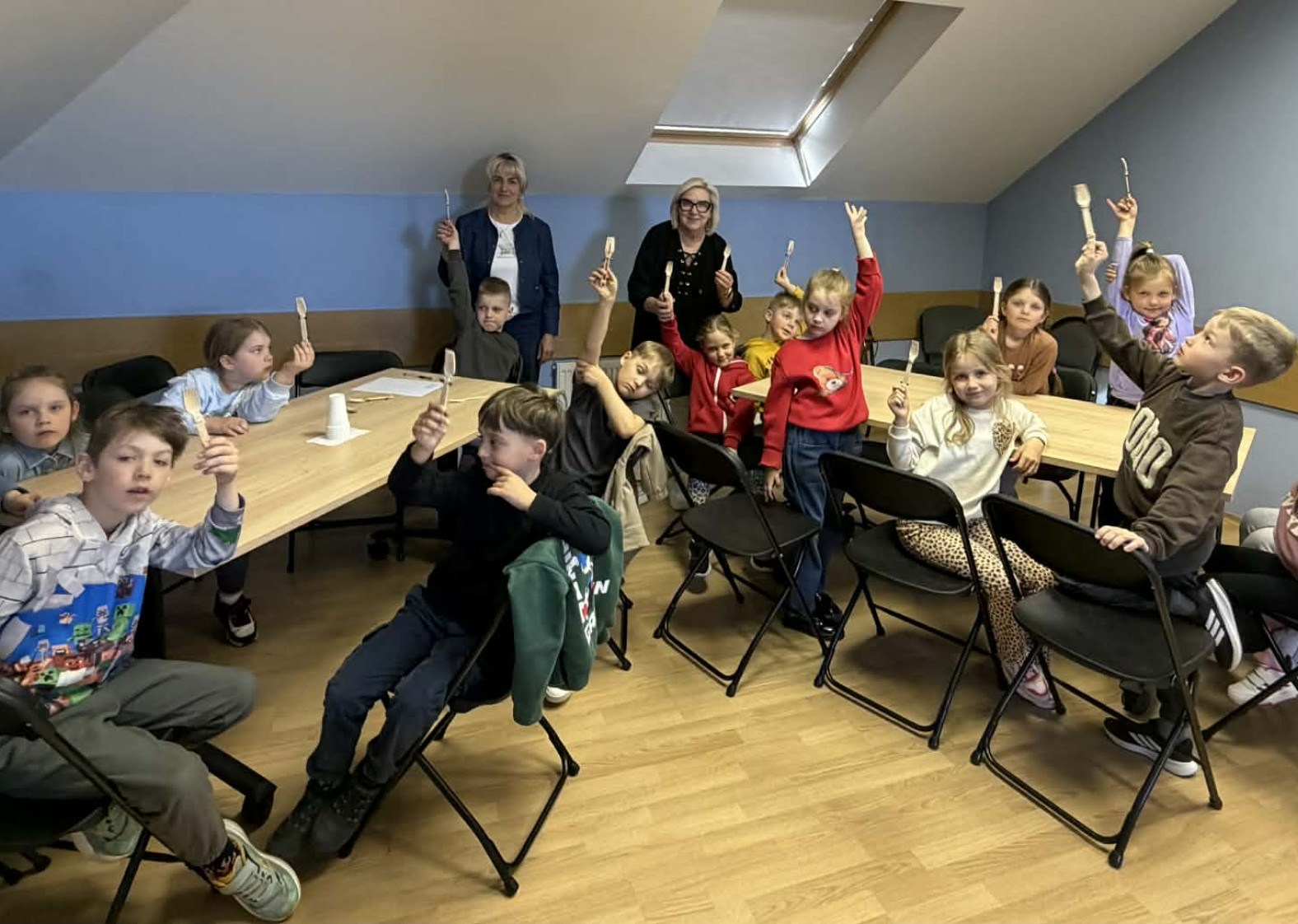 Mažųjų pažintis bibliotekoje su muzikos instrumentais